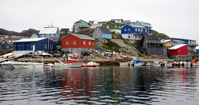 Colorful warehouses and homes climb the rocky slopes of Maniitsoq, Greenland's sixth largest town.